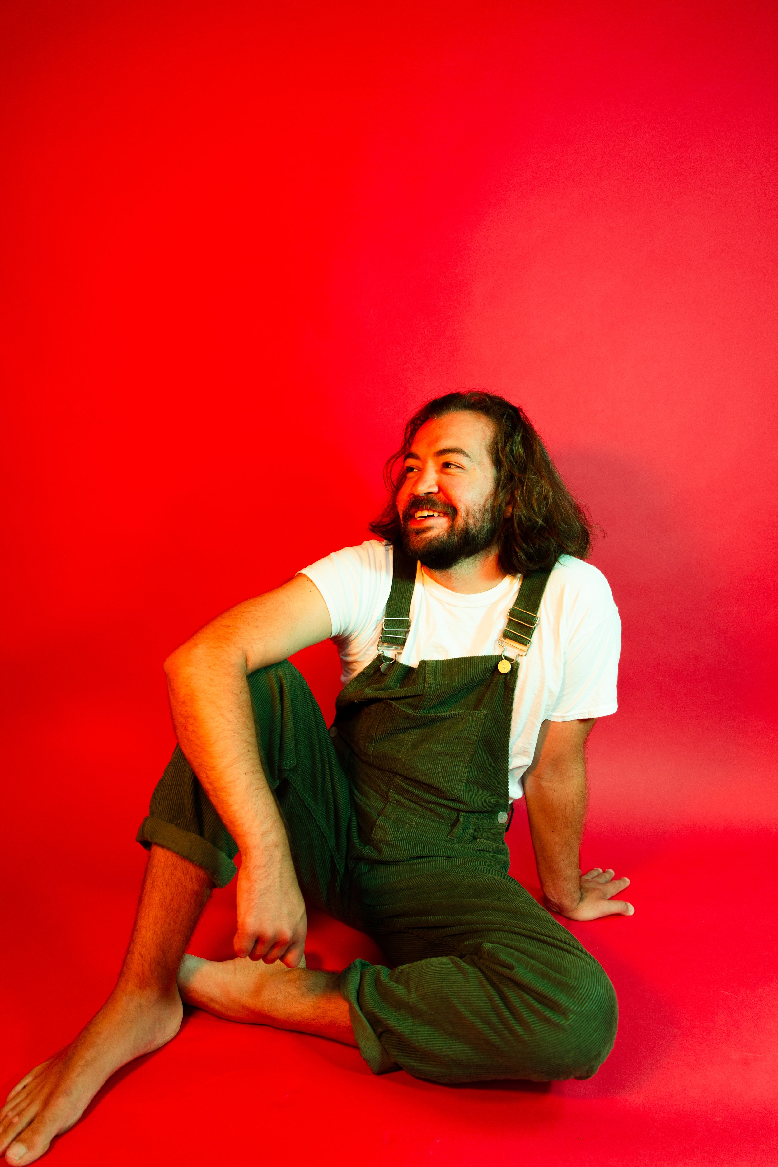 Alec Boyd sitting with a synthesiser