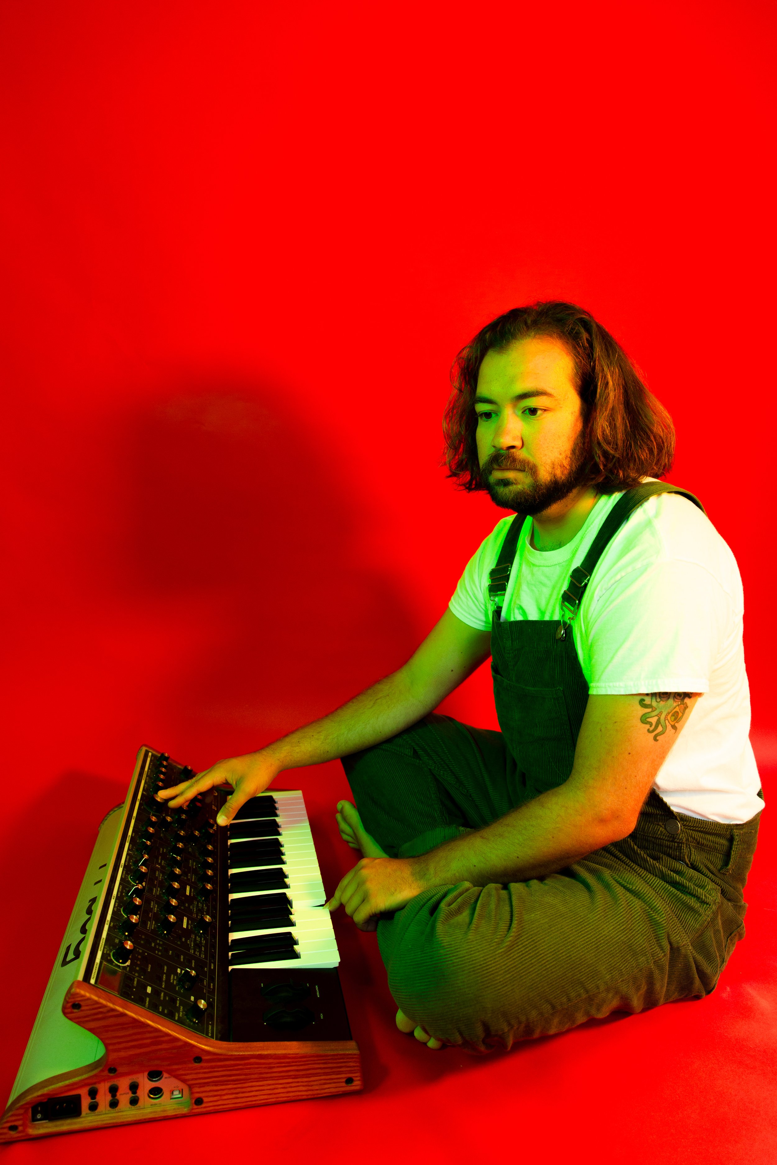 Alec Boyd playing a synthesiser